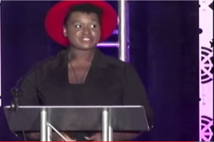 Graduate inspires crowd with life story, slam poetry